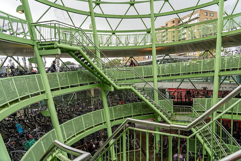 The Fiestappel, bicycle car park for over 900 bicycles, in a stylised apple shape, in Alphen aan den Rijn, directly at the railway and bus station, as well as on a central cycle path, Netherlands