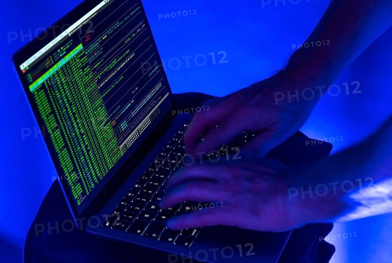 Symbolic image cyber attack, computer crime, cybercrime, computer hackers attack a network, computer, IT infrastructure
