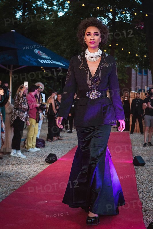 Model at Harald Glööckler's first Fashion Night for his new fashion collection Teuber by HARALD GLÖÖCKLER at Loretta am Wannsee in Berlin on 28 June 2024