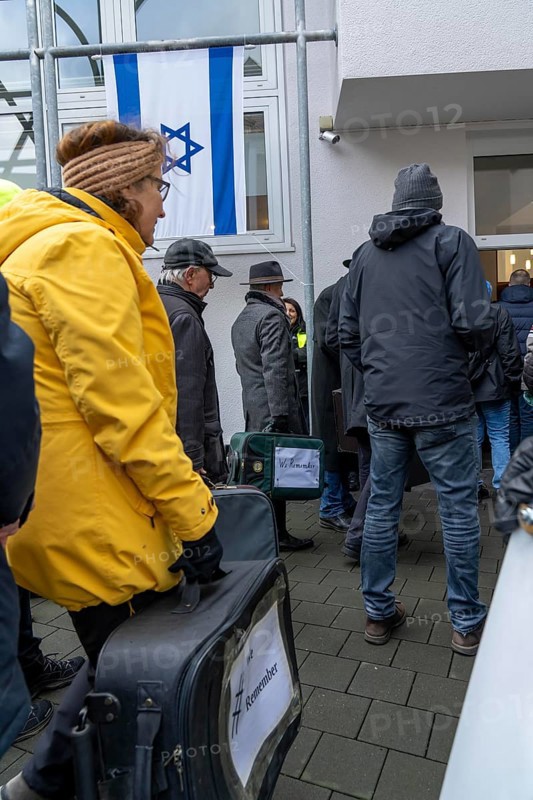 Suitcase march in Recklinghausen, for the 2nd time over 500 people walk through Recklinghausen, carrying suitcases with the inscription #WeRemember, in memory of the deportation of 216 Jews in the Nazi era in RE, on the day in front of the International Holocaust Remembrance Day, to the synagogue, followed by a memorial service, the names of the deported people are written on the pillars, North Rhine-Westphalia, Germany, Europe