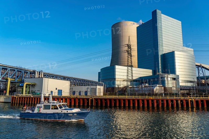 The Datteln 4 coal-fired power plant, operated by Uniper, on the Dormtund-Ems Canal, it is scheduled to go online in summer 2020 after the coal compromise, Datteln, Germany, water police boat, patrol on the canal, Europe