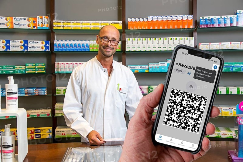Symbolic image of an e-prescription, prescription issued by a doctor, with QR code, is scanned using a mobile phone and a special app, the code is then shown in the pharmacy and the prescription, which is stored on an IT server, can be retrieved there