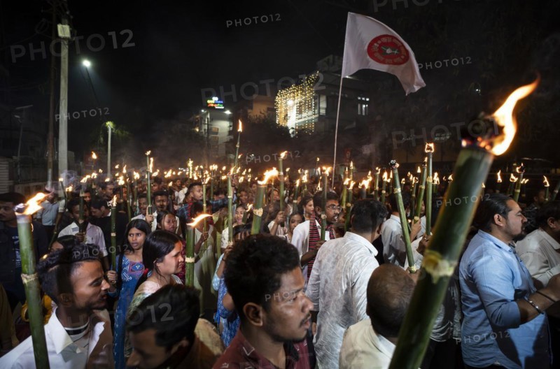 Members of the All Assam Students' Union (AASU) take part in a flaming torch rally and shout slogans to protest against the implementation of the Citizenship Amendment Act (CAA), on March 12, 2024 in Guwahati, Assam, India. The Citizenship Amendment Act (CAA), passed by the Indian Parliament in 2019, indeed grants expedited citizenship to specific religious minorities from Afghanistan, Bangladesh, and Pakistan who arrived in India on or before December 31, 2014. These religious minorities include Hindus, Sikhs, Buddhists, Jains, Parsis, and Christians, Asia