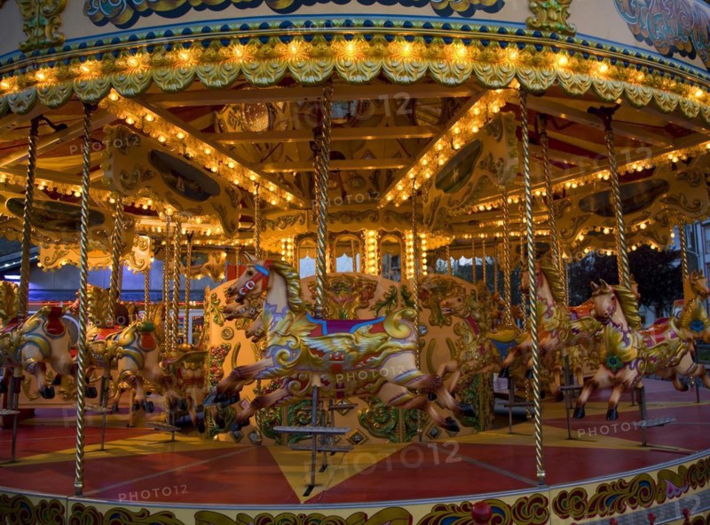 Fairground carousel ride with horses and no people, Weymouth, Dorset, England, United Kingdom, Europe
