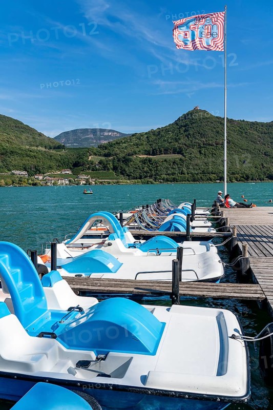 Boat hire, pedal boats, Gretl am See lido on Lake Kaltern, near the village of Kaltern, in the Adige Valley in South Tyrol, one of the two warmest lakes in the Alps, bathing lake, surrounded by vineyards and apple orchards, Italy, Europe