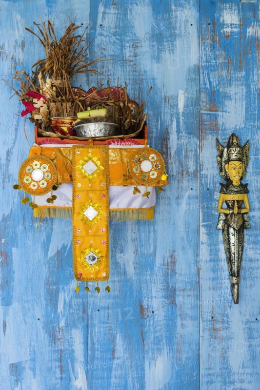 Temple ornament with offering, Hinduism, Hindu, religion, world religion, God, worship, worshiping, praying, praying, offering, asian, icon, colourful, colourful, image, decorated, tradition, culture, decorated, meditation, mythology, sacrifice, blessing, art figure, art, church, spirituality, spiritual, holy, blue, yellow, complementary, Bali, Indonesia, Asia
