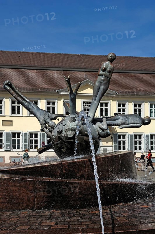 Fountain on Karlsplatz, 1978 by Michael Schoenholtz, the fountain commemorates the humanist and cosmographer Sebastian Münster 1488-1552, Heidelberg, Baden-Württemberg, Germany, Europe