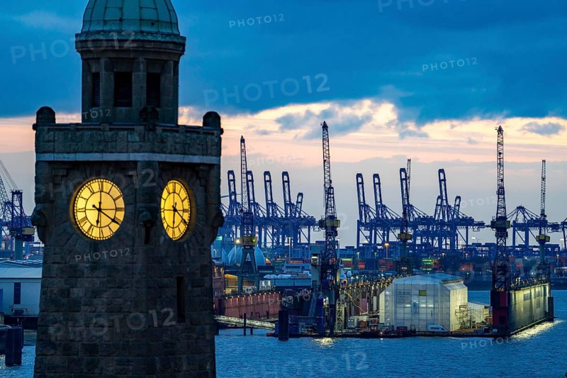 Port of Hamburg, view over the observation tower at the St. Pauli Landungsbrücken to the Blohm + Voss shipyard, Dock 11, evening, cranes of the container terminals, Hamburg Germany