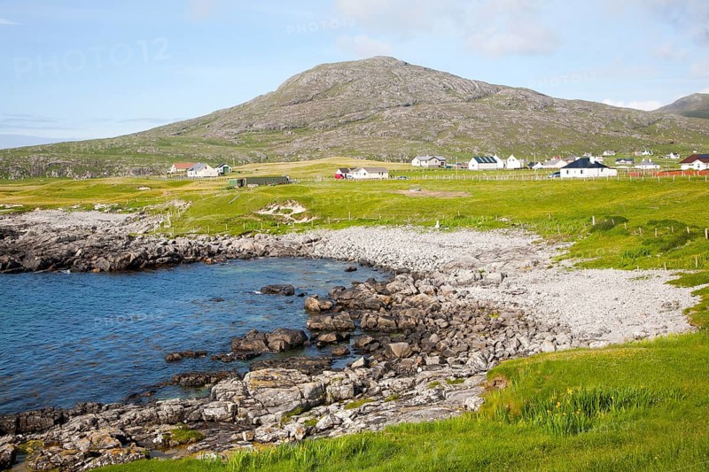 Atlantic coastline rocky headlands and small pebble bays at Borgh, Barra, Outer Hebrides, Scotland, UK