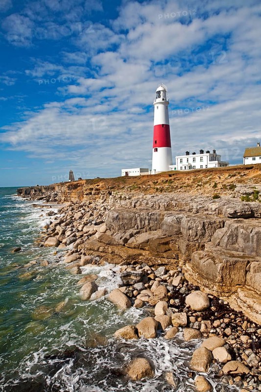 Red and white lighthouse on the coast at Portland Bill, Isle of Portland, Dorset, England, United Kingdom, Europe