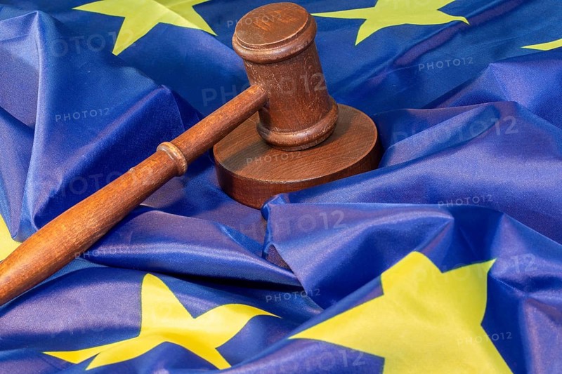Symbolic image: Judge's gavel on a flag of the European Union