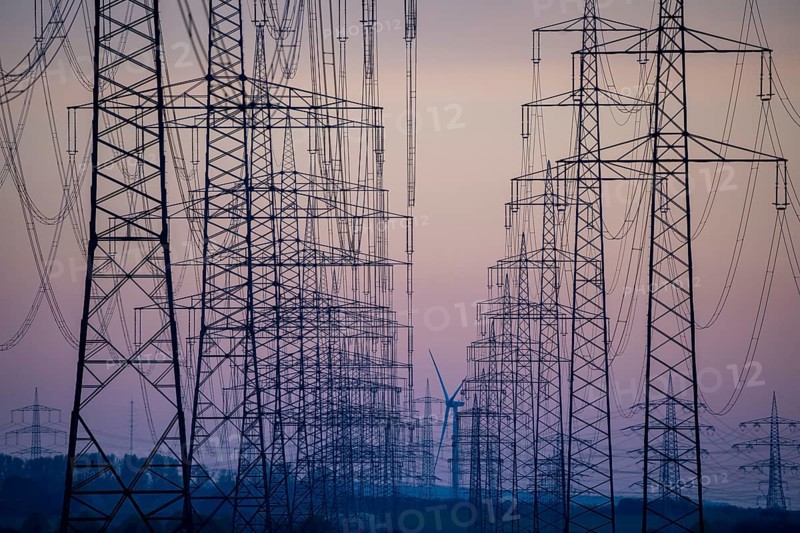 Extra-high-voltage lines, 380 KV, power line, wind turbine, the electricity comes from the Rhenish lignite mining area, at the Neurath power station, near Grevenbroich, Germany, Europe