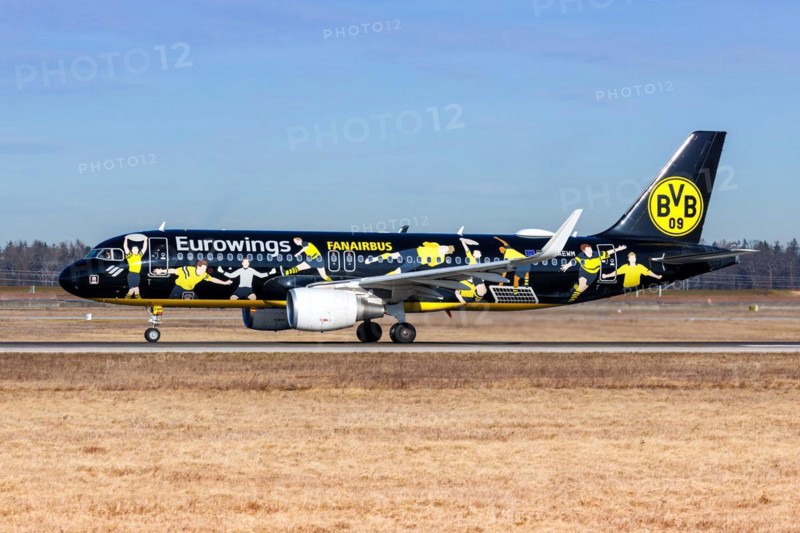 A Eurowings Airbus A320 aircraft with the registration D-AEWM and the Borussia Dortmund special livery at Stuttgart Airport, Germany, Europe