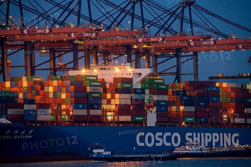 Container ship of the shipping company Cosco Shipping, CSCL SATURN, being loaded and unloaded, Euromax Container Terminal, container freighter, in the seaport of Rotterdam, Yangtzehaven, Netherlands, deep-sea harbour Maasvlakte 2, on an artificial land area off the original coastline