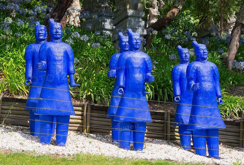 A group of blue terracotta warrior statues surrounded by plants and trees, Bacalhôa, Bacalhoa Buddha Eden, Quinta dos Loridos, largest oriental garden in Europe, Bombarral, Oeste, Centro, Portugal, Europe