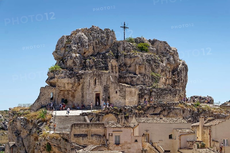 The rock church of Santa Maria dell'Idris towers over the Sasso Caveoso district of the cave town of Matera. The cave settlements, Sassi, are a UNESCO World Heritage Site. Matera, Basilicata, Southern Italy, Southern Europe