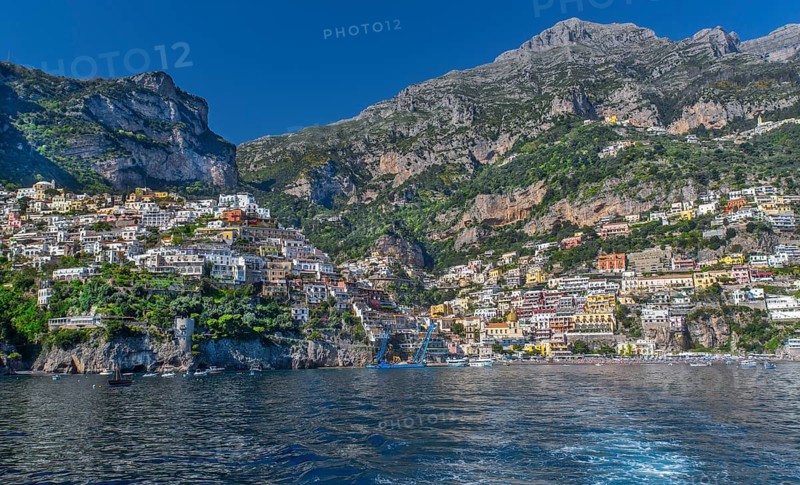 View from the boat of the village on the cliffs above the sea, Positano, Amalfi Coast, Amalfitana, Campania, Italy, Europe