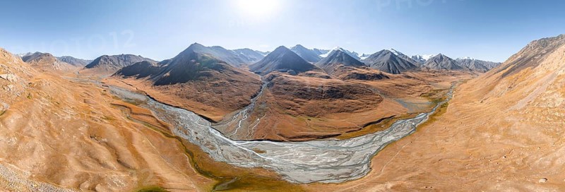 Aerial view, Burkhan mountain valley with meandering river, barren dramatic mountain landscape, Terskey Ala-Too, Tien Shan, Issyk Kul province, Kyrgyzstan, Asia