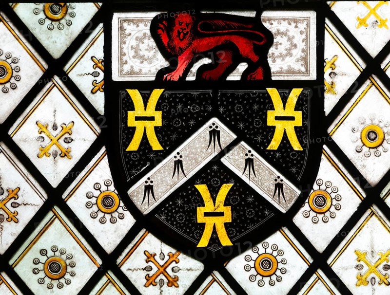Detail of stained glass east window with heraldic design, church of All Saints, Rede, Suffolk, England, UK, Arms of Turner baronets of Warham, Norfolk