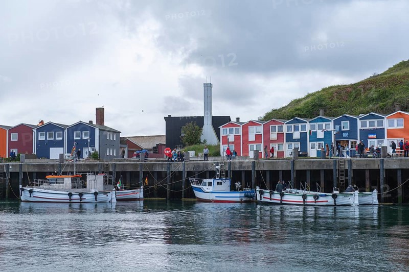 Colourful lobster shacks on the harbour promenade, Börteboote, offshore island of Heligoland, North Sea, Pinneberg district, Schleswig-Holstein, Germany, Europe