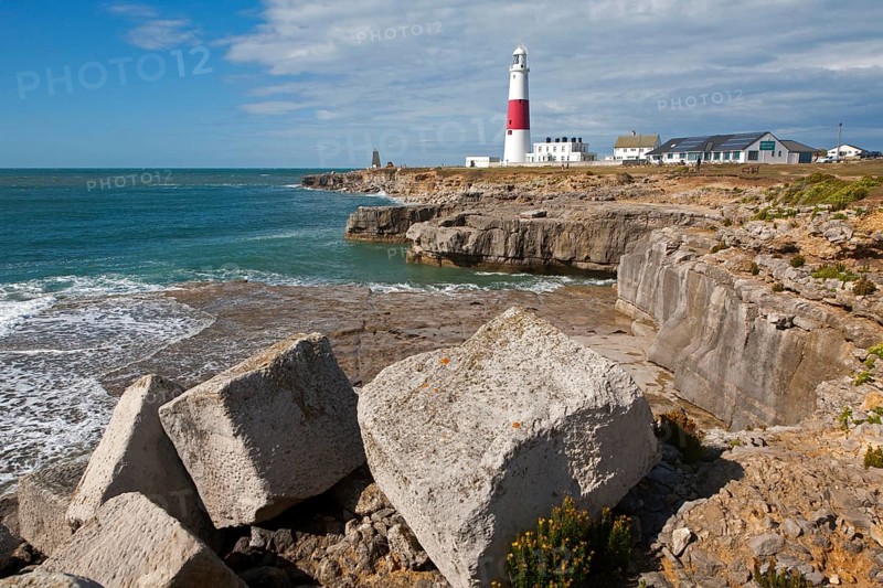 Red and white lighthouse on the coast at Portland Bill, isle of Portland, Dorset, England, United Kingdom, Europe