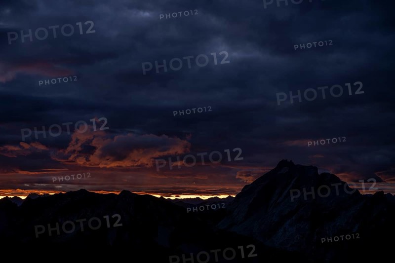 Montafon mountains with dramatic cloudy sky at sunrise, Tschagguns, Rätikon, Montafon, Vorarlberg, Austria, Europe