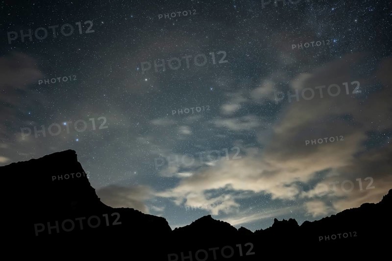 Milky Way and starry sky with Montafon mountains, Tschagguns, Rätikon, Montafon, Vorarlberg, Austria, Europe