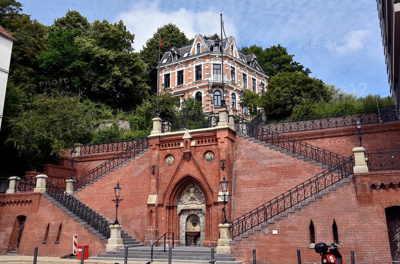 Europe, Germany, Hanseatic city of Hamburg, Altona district, Große Elbstraße, Köhlbrand staircase from 1887, staircase from the Elbe, brick building with fountain with coats of arms of Altona and Prussia, wall surfaces of the staircase with Mercury and Neptune illustration, Europe