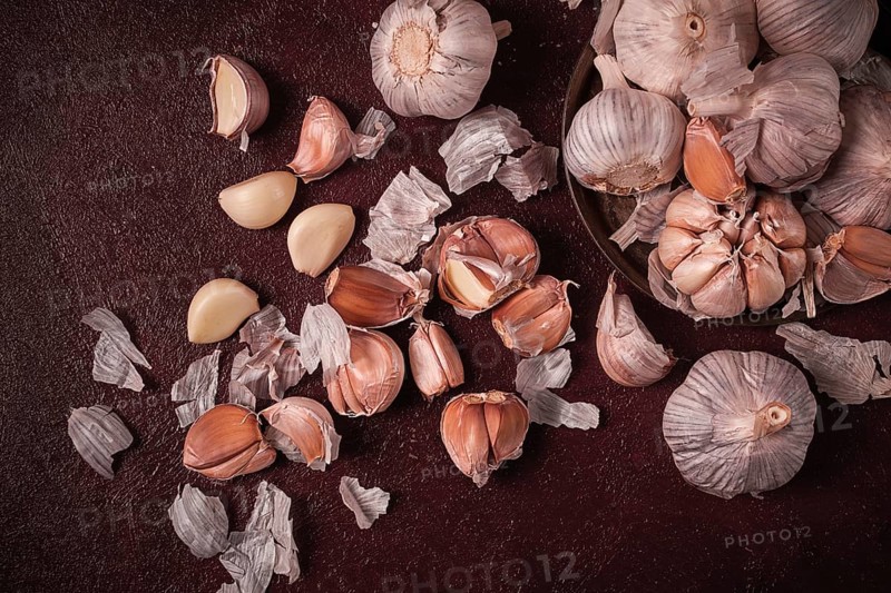 Fresh garlic, on a dark background, top view, food concept