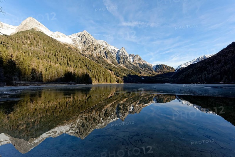 Winter on an icy lake, Lake Antholz in the Antholz Valley, Val Pusteria, South Tyrol, Italy, Europe