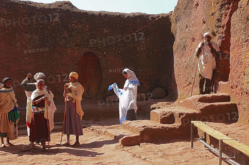 Rock churches of Lalibela, pilgrims in front of the entrance to Bete Maskal, Chapel of the Cross, Ethiopia, Africa