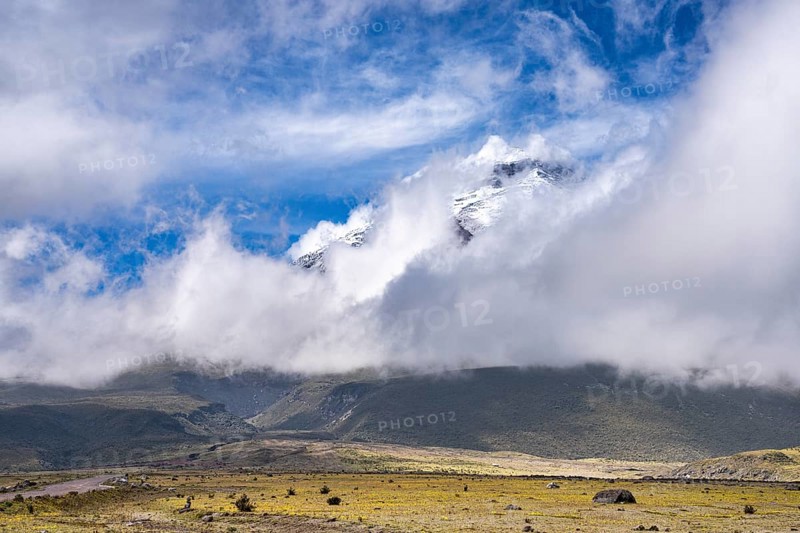 Cloud-shrouded Cotopaxi volcano, Cotopaxi, Cotopaxi National Park, Latacunga, Ecuador, South America