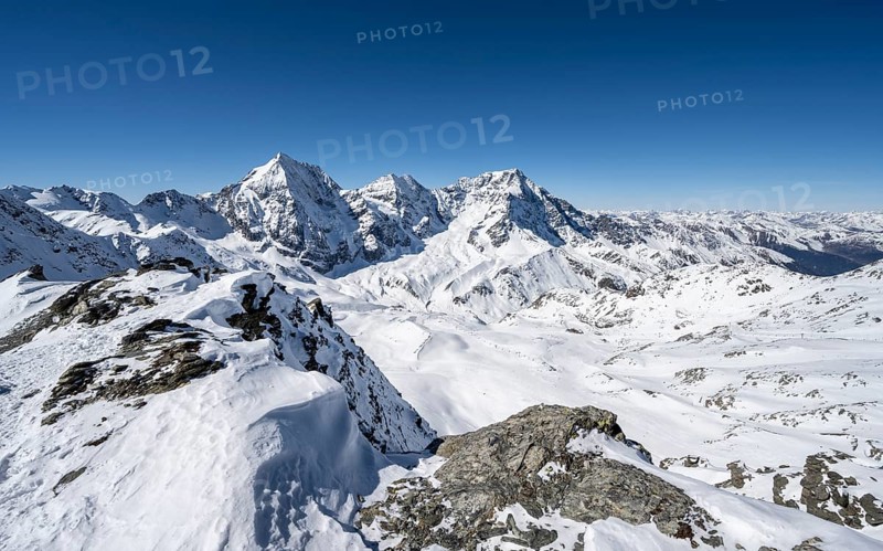 Mountain panorama with snow-covered mountain landscape in winter, view of mountain peaks Königsspitze, Monte Zebru and Ortler, summit of Madritschspitze, Ortler Alps, Vinschgau Valley, Italy, Europe