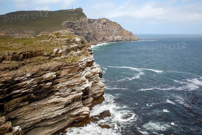 Rocky coast at the Cape of Good Hope with cliffs of rock layers