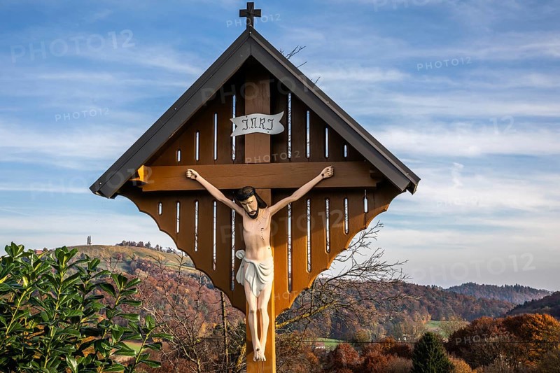 Wayside shrine, Christ on the cross, autumn atmosphere, forest with foliage colouring, near Kitzeck, Sausal wine country, Styria, Austria, Europe