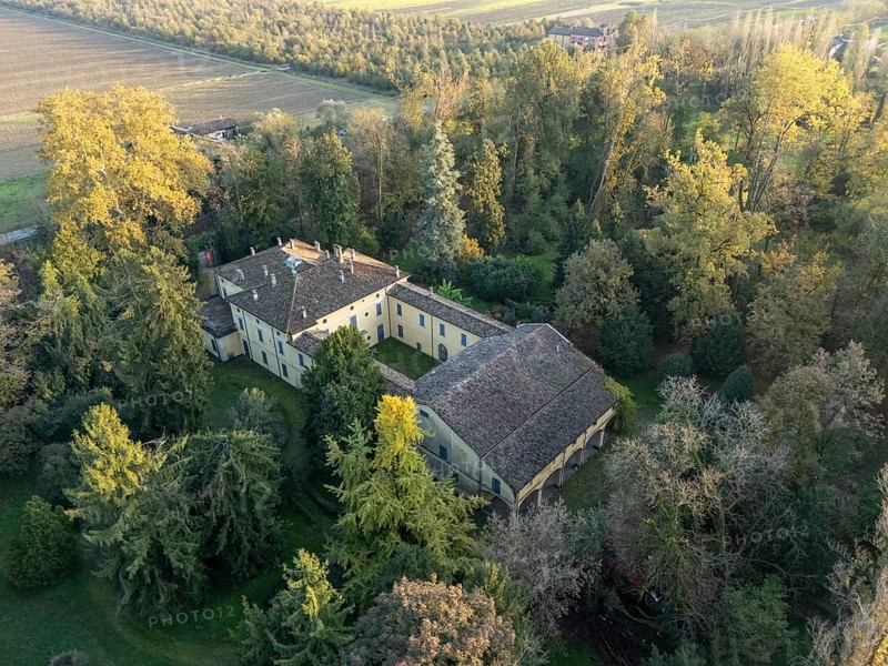 Aerial view of the sant'agata villa, the house of giuseppe verdi, surrounded by colorful autumn foliage in busseto, parma, italy. Busseto, Parma, Italy November 3rd 2024