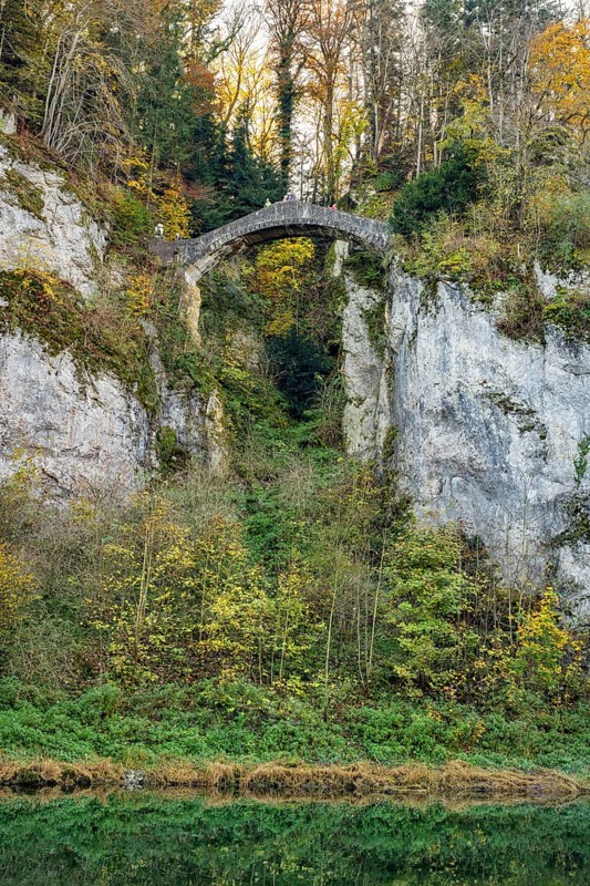 Built in 1895, the Devil's Bridge above the Danube, a striking sight in Inzigkofen Princely Park, leads over the almost 20 metre deep Höllschlucht gorge, Danube valley, Sigmaringen district, Baden-Württemberg, Germany, Europe