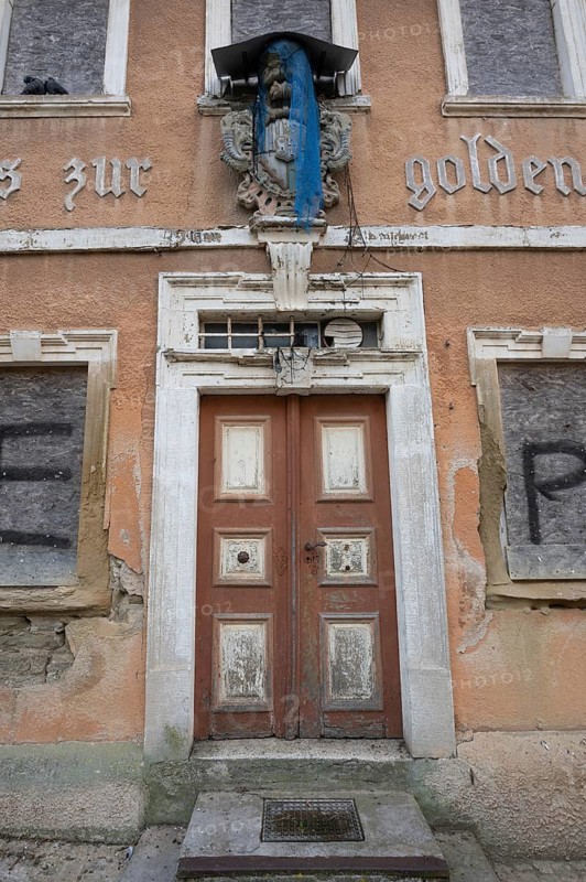 Coat of arms of the Schwarzenbergs, Franconian-Bohemian noble family above the entrance door, 1752, today an empty inn, Hüttenheim 5, Hüttenheim, Lower Franconia, Bavaria, Germany, Europe