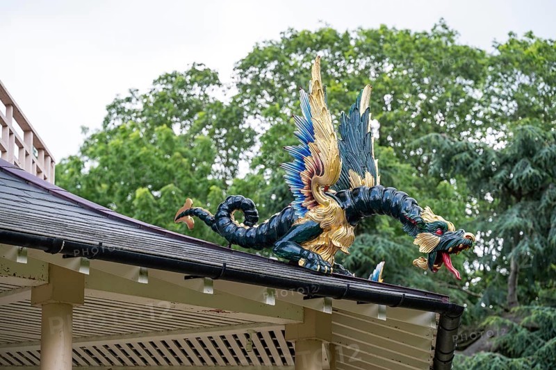 Close-up of a gold-blue-red painted dragon statue, historic large pagoda, Royal Botanic Gardens (Kew Gardens), UNESCO World Heritage Site, Kew, Greater London, England, Great Britain