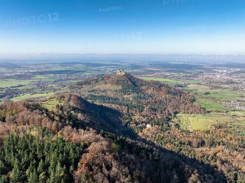 Aerial view from the Albtrauf over a mixed forest on the 956 metre high Raichberg to the Zeugenberg with Hohenzollern Castle near Hechingen, Zollernalbkreis, Baden-Württemberg, Germany, Europe