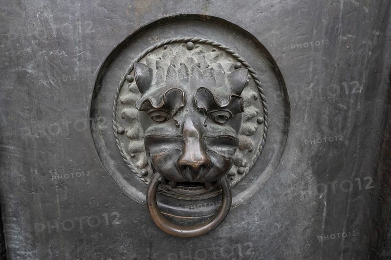 Lion's head as door opener at the entrance portal of St Lorenz Church, Nuremberg, Middle Franconia, Bavaria, Germany, Europe
