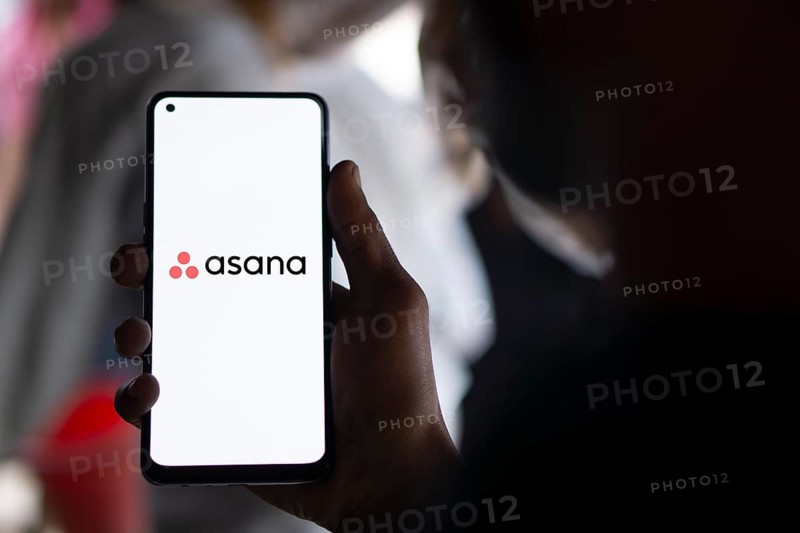 Dhaka, Bangladesh- 09 Nov 2024: Asana logo is displayed on smartphone