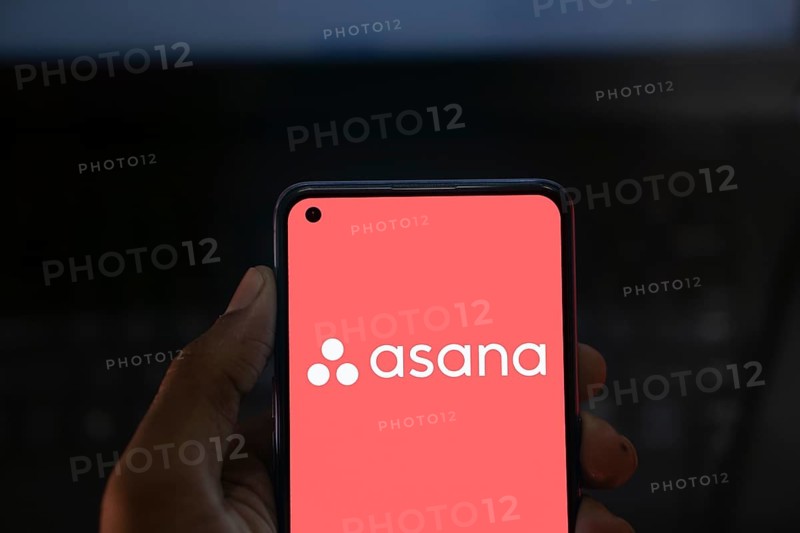 Dhaka, Bangladesh- 09 Nov 2024: Asana logo is displayed on smartphone