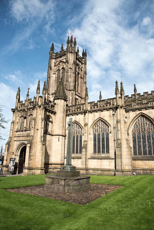 Exterior view of the famous medieval building of the cathedral of the city of Manchester in United Kingdom