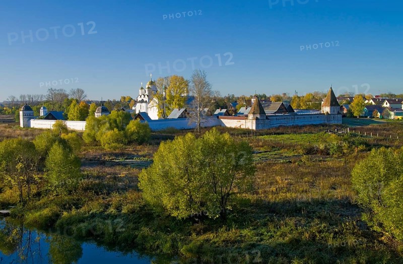 Look at the Pokrovsky Monastery (founded in 1364) from the walls of the Efimov Savior monastery across the river Kamenka, Autumn. Suzdal, Russia, Europe