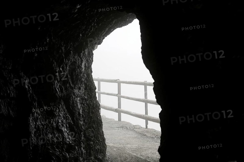 View from the tunnel into the icy mountain landscape