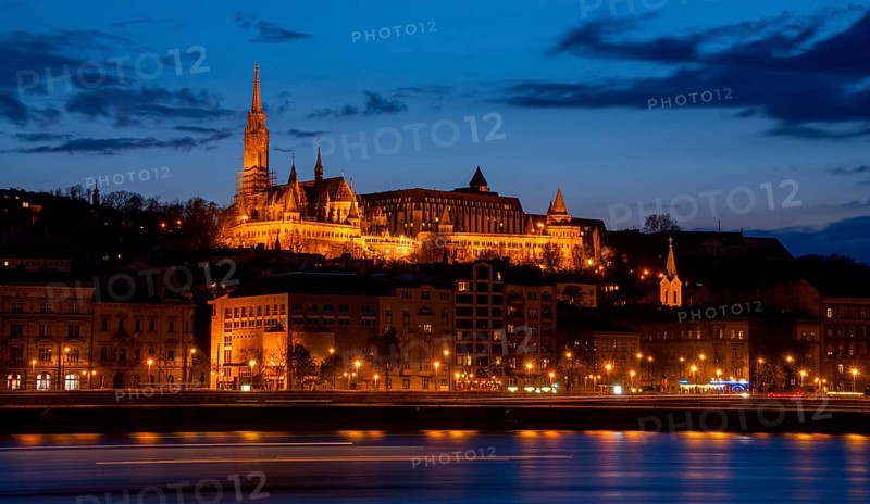Royal Palace or the Buda Castle after sunset with lights illuminated at in danube river in Budapest in Hungary