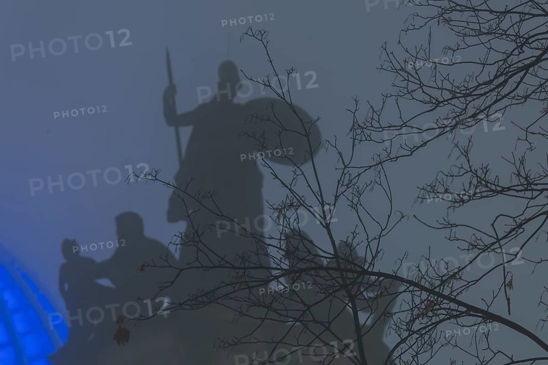 The old town of Dresden shrouded in November fog. Octagon dome with Fama and pediment figures of Athena of the Lipsius building, Foggy atmosphere in Dresden, Dresden, Saxony, Germany, Europe