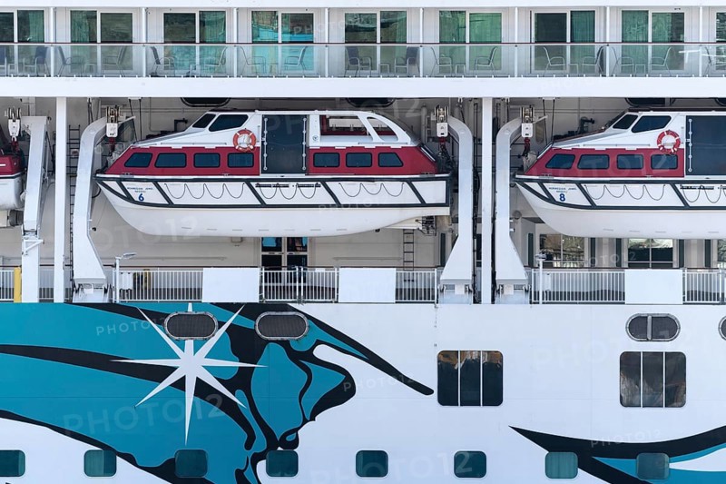 PACIFIC OCEAN, KAMCHATKA PENINSULA, RUSSIAN FAR EAST, 10 MAY, 2019: Multiple deck of luxury Expedition Passenger Cruise Liner Norwegian Jewel (Norwegian Cruise Line) with lifeboats aboard ship