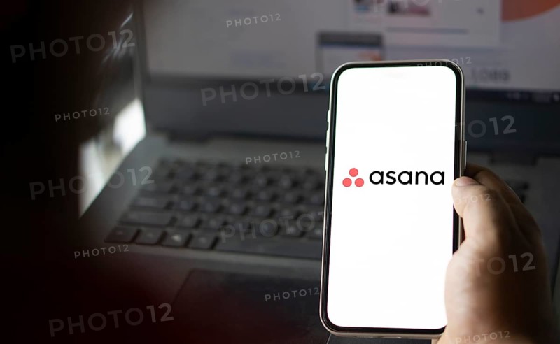 Dhaka, Bangladesh- 09 Nov 2024: Asana logo is displayed on smartphone